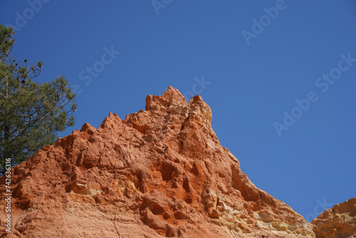 Sandstone walls on the coast weathered © helfei