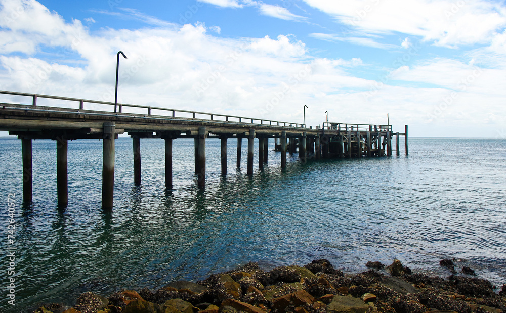 Wooden jetty of Kingfisher Bay on the west coast of Fraser Island (K'gari), where the ferry from Rivers Head travels to the continental Queensland, Australia