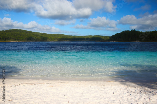 Lake McKenzie (Boorangoora) on Fraser Island (K'gari) is a perched lake of pure turquoise freshwater surrounded by pure white silica sand in Queensland, Australia photo