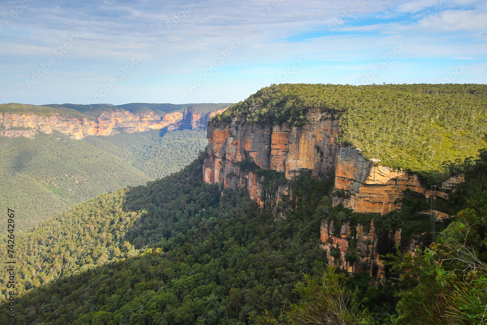 View over the cliffs and lush valleys of the Blue Mountains National Park from Govetts Leap Lookout in New South Wales, Australia View over the cliffs and lush valleys of the Blue Mountains National Park from Govetts Leap Lookout in New South Wales, Australia