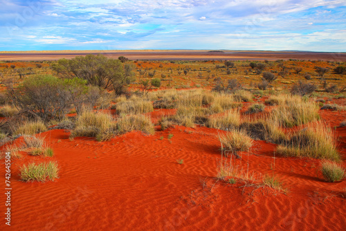 Dry lake in the desert plains of the Red Center of the Northern Territory of Australia photo