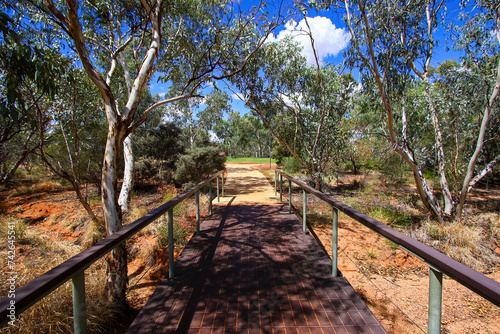 Footpath in the Alice Springs Telegraph Station Historical Reserve in the Red Centre of Australia  connecting Darwin to Adelaide via the Overland Telegraph Line