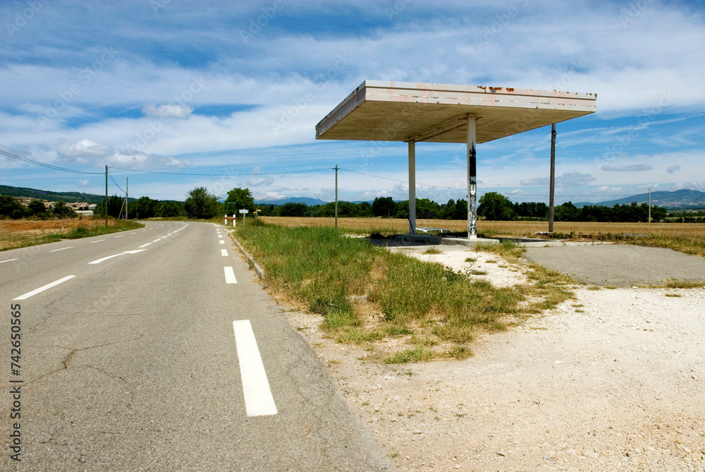 abandoned gas station at a rural road, Vaucluse near Sault , France - obrazy, fototapety, plakaty 