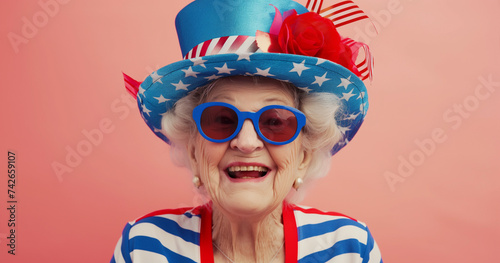 Eccentric patriotic grandma celebrating fourth of july, wearing independence day colors and uncle sam hat with ribbons and stars