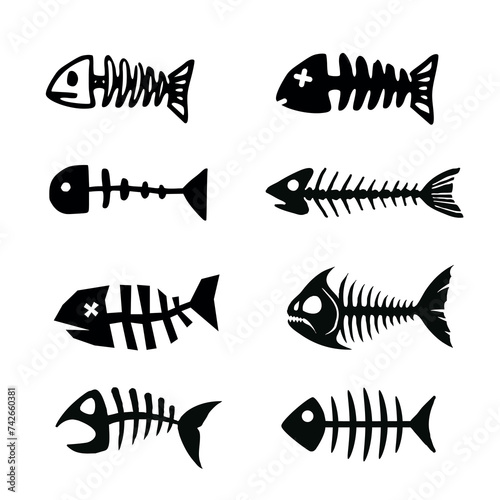 Set of silhouettes of dead fish and fish bones