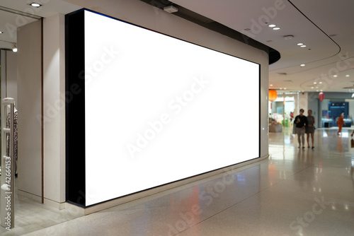 large empty billboard in shopping mall, prime retail location for high-impact branding