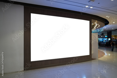 large empty billboard in shopping mall, prime retail location for high-impact branding