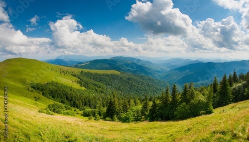 a gorgeous landscape of wooded slopes and distant mountain ranges carpathian mountains ukraine europe © Kristopher