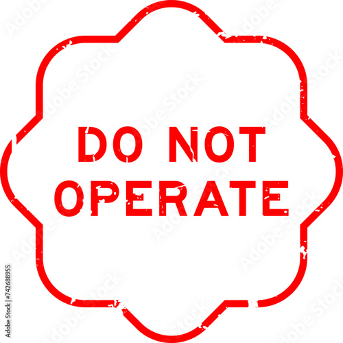 Grunge red do not operate word rubber seal stamp on white background