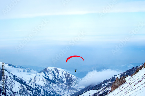 preparation for paragliding over the mountains