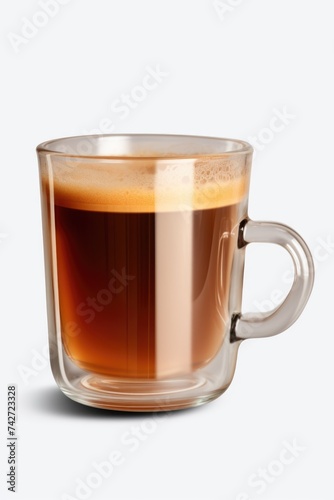 A glass cup of coffee with liquid, suitable for coffee shop promotions