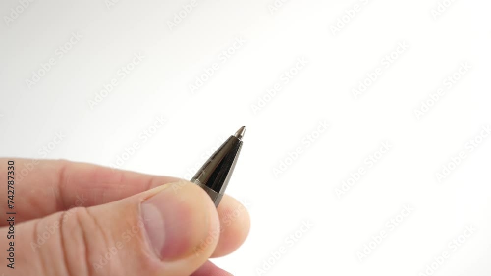 The ballpoint ink pen protrudes from the pen body. Stationery. The ballpoint ink pen protrudes from the pen body. Stationery.