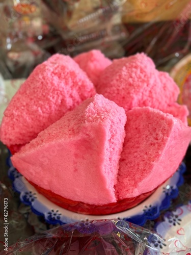 large pink steamed cupcake , kue mangkok photo