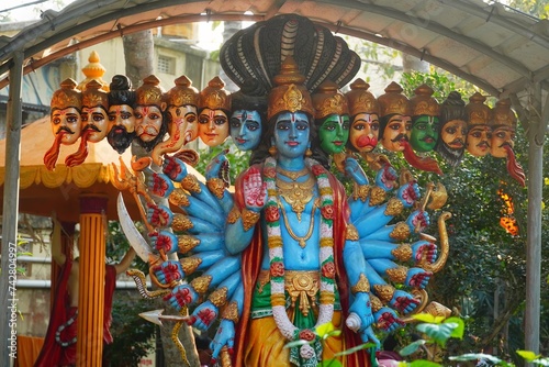 Photography statue of god vishnu with multiple heads