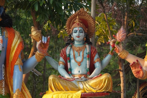 sculpture of god vishnu in meditation pose photo