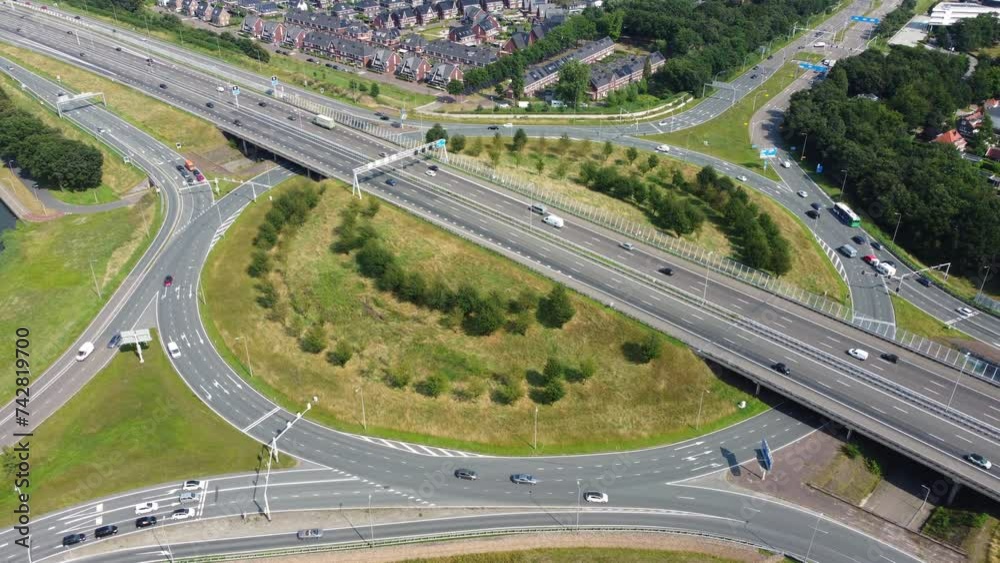 Traffic at a highway junction at Zwolle where the A28 highway runs through the city in Overijssel, The Netherlands. Traffic at a highway junction at Zwolle where the A28 highway runs through the city in Overijssel, The Netherlands.