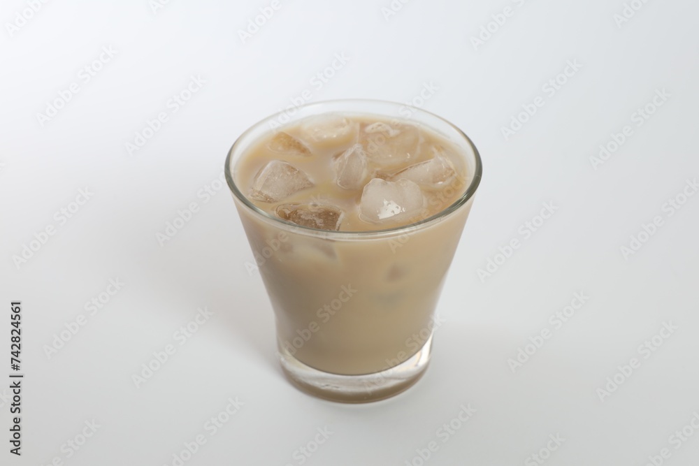 Iced coffee in glass on white background Iced coffee in glass on white background