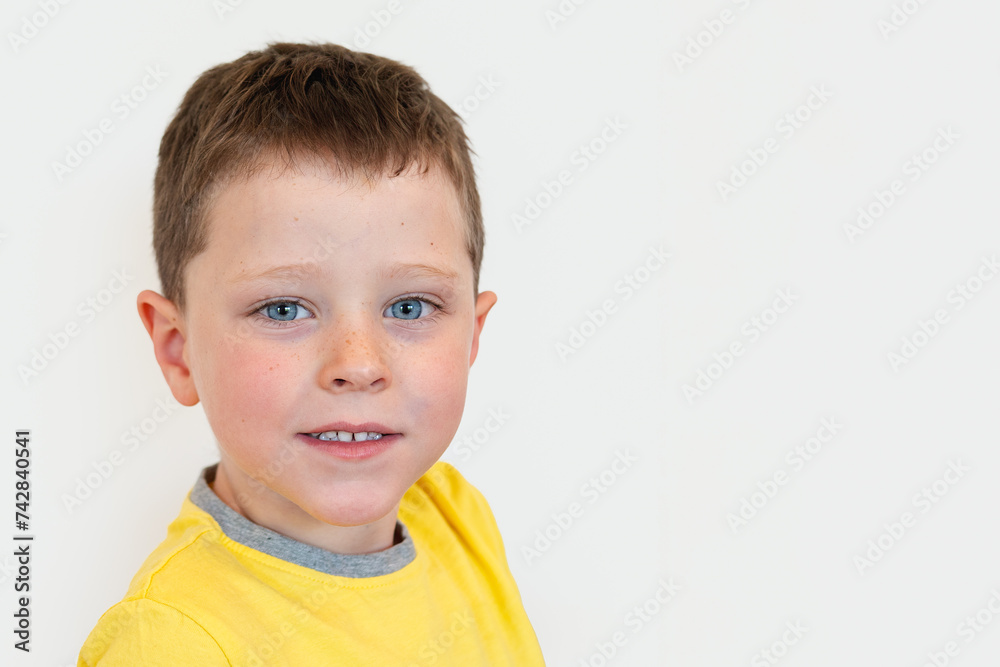 blond boy with blue eyes on white background blond boy with blue eyes on white background