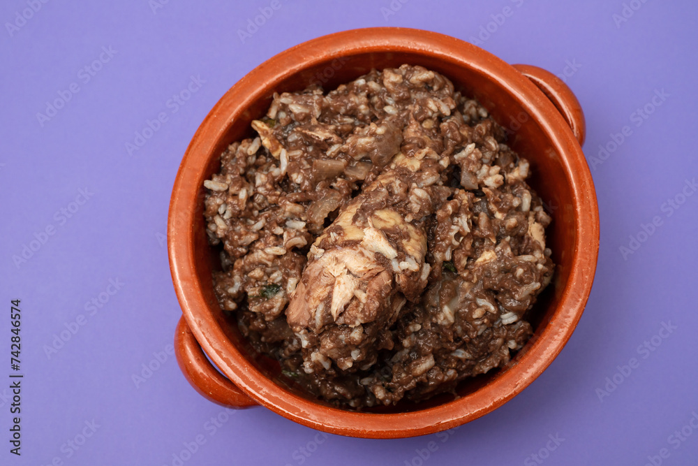 Typical portuguese dish chicken with rice in ceramic dish. Typical portuguese dish chicken with rice in ceramic dish.
