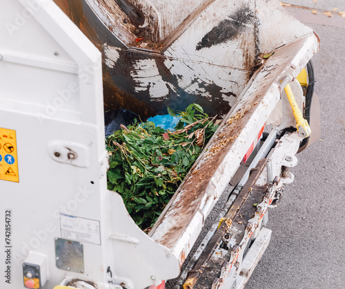 Italian garbage truck. Collection of wet waste and clippings.