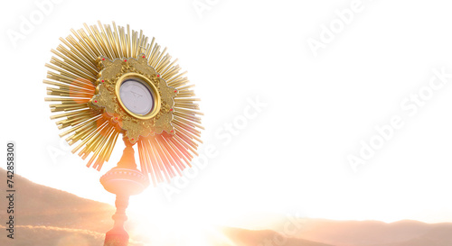 Jesus Christ in the monstrance. Sacrament of the Eucharist. Corpus Christi - 3D Illustration photo