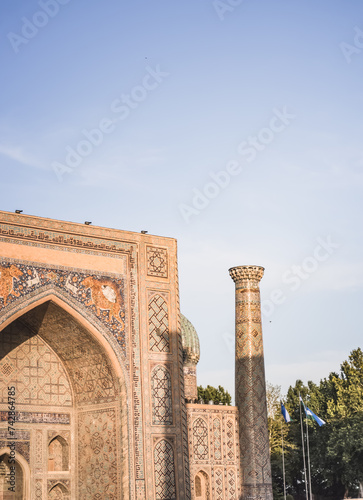 Eastern architecture of buildings  madrasahs  mausoleums and mosques made of brick and mosaic cladding on the facades in the ancient city of Samarkand in Uzbekistan