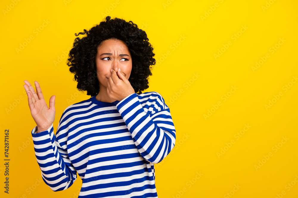Photo of annoyed irritated disappointed lady wear trendy clothes avoid disgusted smell empty space isolated on yellow color background - obrazy, fototapety, plakaty 