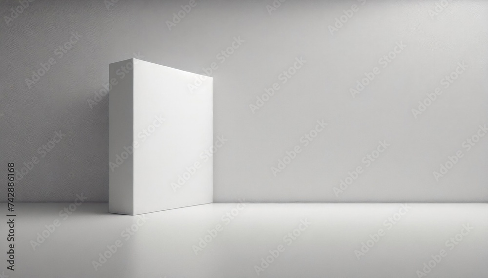 A solitary white cube stands against a textured grey wall on a smooth surface. A solitary white cube stands against a textured grey wall on a smooth surface.