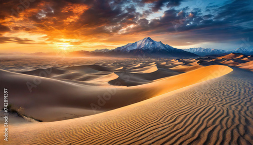 sand dunes with dramatic sunset  mountain in the orizon
