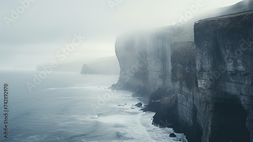 A photo of a misty cliffside