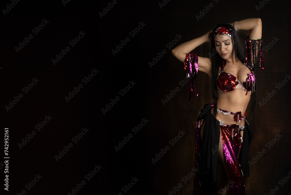 Bellydancer dancing black background banner Bellydancer dancing black background banner