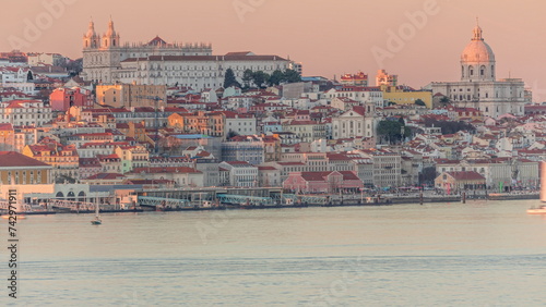 Panorama of Lisbon historical center and ferry terminal Terreiro do Paco aerial timelapse during sunset from above. Portugal photo