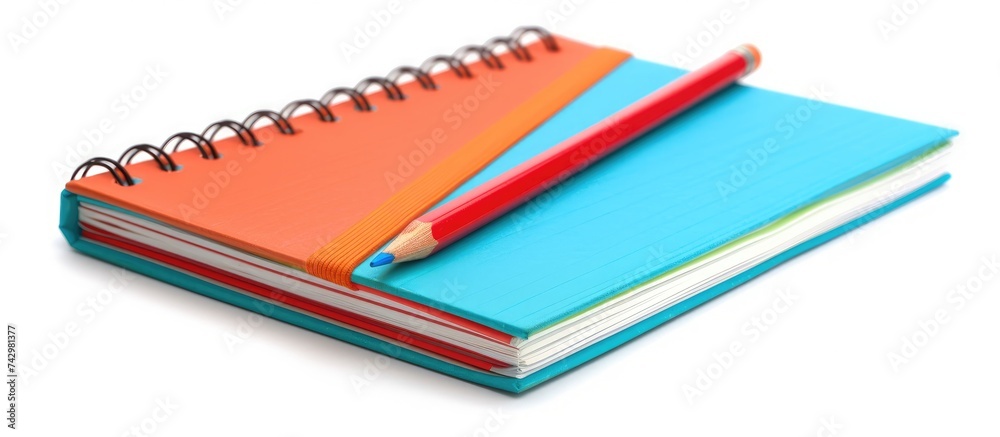 A stack of three notebooks neatly arranged side by side on a flat surface. The notebooks are closed and appear to be in good condition. A stack of three notebooks neatly arranged side by side on a flat surface. The notebooks are closed and appear to be in good condition.