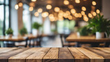 Empty wooden table with blurred restaurant background, space for caption. Symbolizes dining ambiance and potential for storytelling