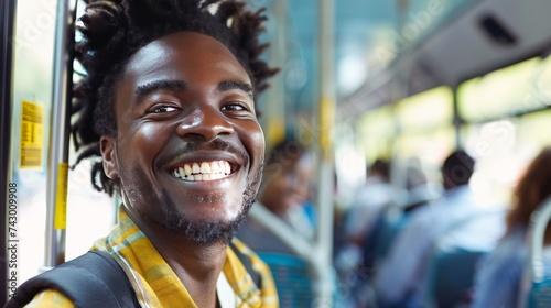 Smiling man with dreadlocks enjoying a bus ride in the city. Cheerful African American man traveling by bus, portraying positive city life vibes.