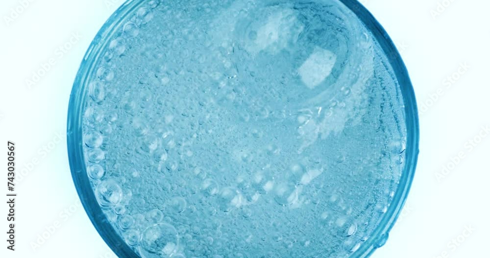 Pouring fresh pure sparkling water from bottle into a glass. Bubbles in water on super slow motion. Pouring fresh pure sparkling water from bottle into a glass. Bubbles in water on super slow motion.