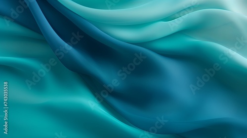 Elegant abstract background featuring smooth waves of turquoise and blue fabric. High-quality image for design use.