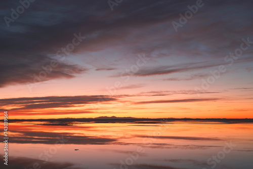 Sunrise at Bonneville Salt Flats with spectacular water reflections near Wendover  Utah Unit4ed States © SimmyN