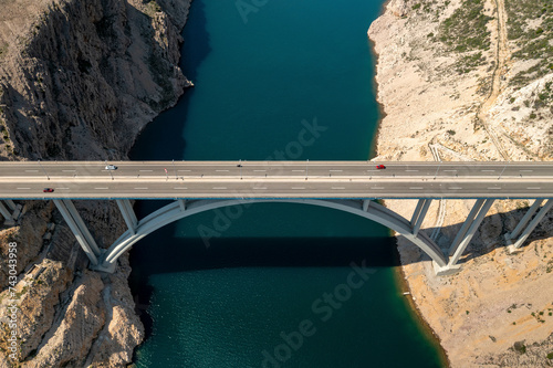 Aerial view of Maslenicki Most bridge, modern bridge crossing a scenic river in Zadar, Croatia. photo