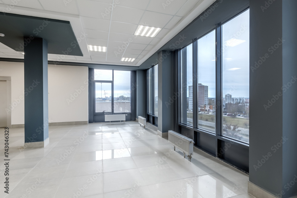 panorama view in empty modern hall with columns, doors , stairs and panoramic windows. panorama view in empty modern hall with columns, doors , stairs and panoramic windows.