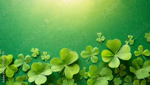  Green st patrick's day background with clovers copy space