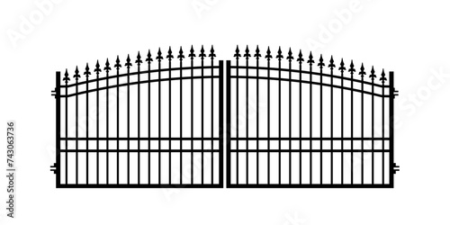 silhouette of wrought iron gate