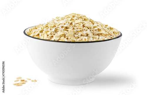 Bowl of dry rolled oats isolated on white background