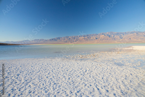 Lake Manly and salt flats at Badwater Basin in Death Valley National Park  California