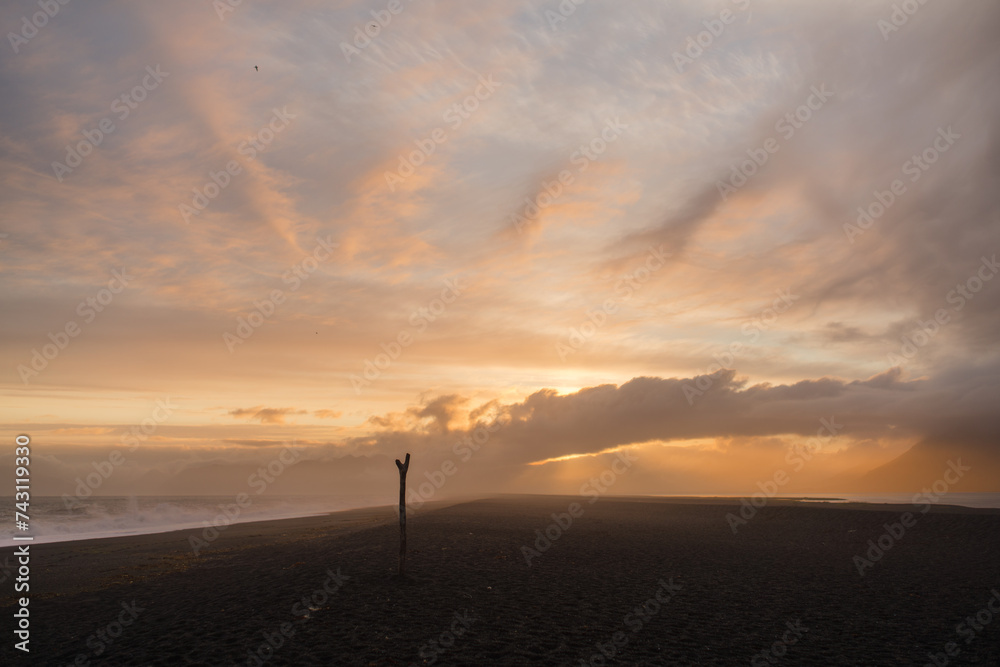 Traveling and exploring Iceland landscapes and famous places. Autumn tourism by Atlantic Ocean and mountains. Outdoor views on beautiful cliffs and travel destinations.