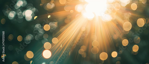 abstract bokeh background with lens flares particles and light rays. Yellow and green. photo