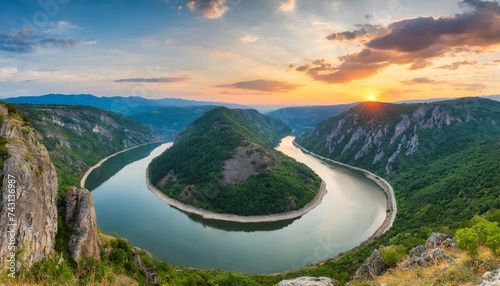 panoramic sunset view with one of most picturesque meander of arda river near kardzhali rodopi mountains in bulgaria photo