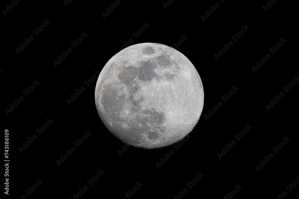 Photograph taken with a telescope of the full moon during winter. Lunar craters in photo taken with a reflex camera. Space missions to the Moon Photograph taken with a telescope of the full moon during winter. Lunar craters in photo taken with a reflex camera. Space missions to the Moon