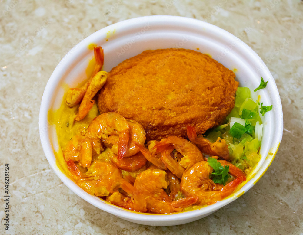 Brazilian acarajé traditional food of African origin in Bahia with vatapá caruru and dried shrimp Brazilian acarajé traditional food of African origin in Bahia with vatapá caruru and dried shrimp