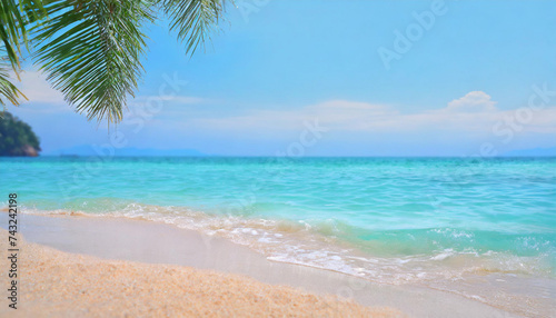 Tropical beach with sand and turquoise seascape background. 